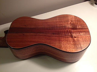 Treble-Rose ukulele made in Koa with spruce top and rosewood highlights back view